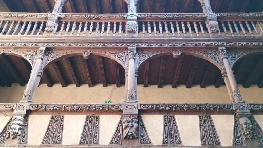 Balcony with wooden carvings, Maison de l'Oevre Notre-Dame