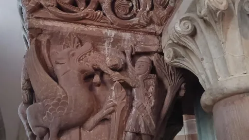 Capitel with combat scene: Knight and dragon