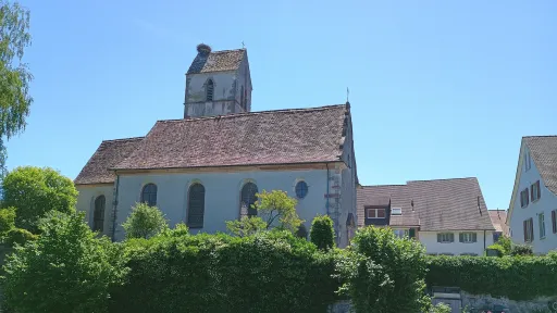 Church with storks nest, Kaiseraugst, viewed from the Rhine