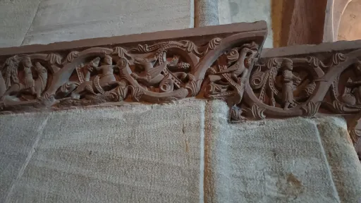 Animals, humans and hybrid creatures on a frieze in the crypt of Basel cathedral